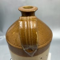 Kintsugi restauratie aan steengoed kruik  4.jpg